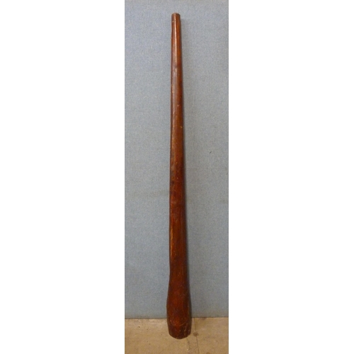 385 - A vintage wooden didgeridoo