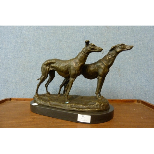 397 - A bronze figure of two greyhounds after Emmanuel Fremiet