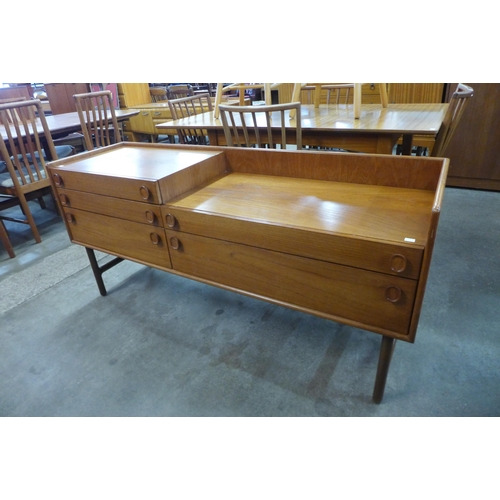 40 - A Meredew teak five drawer sideboard