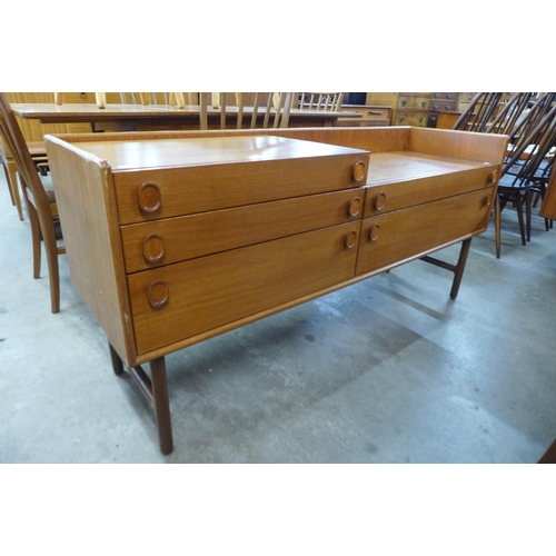 40 - A Meredew teak five drawer sideboard