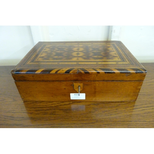 410 - An Edward VII marquetry inlaid walnut box with key