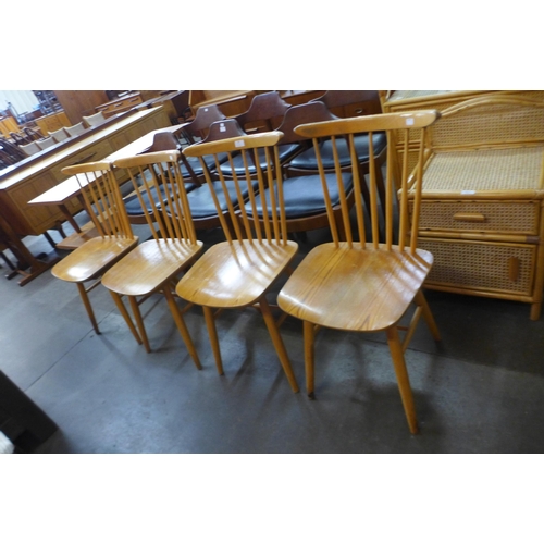 49 - A set of four beech kitchen chairs