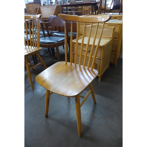 49 - A set of four beech kitchen chairs