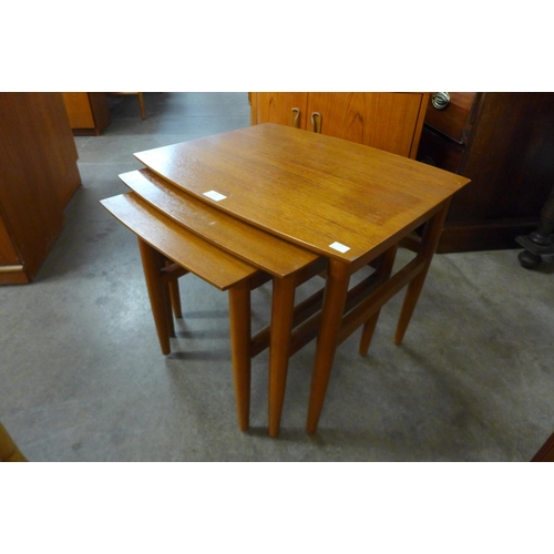 69 - A teak nest of tables