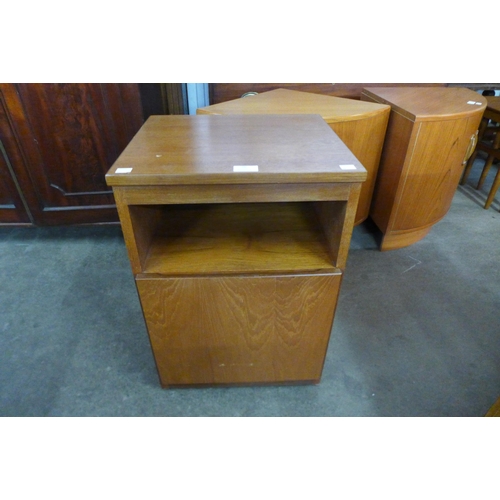 70 - A teak bedside cupboard and a small teak chest of drawers