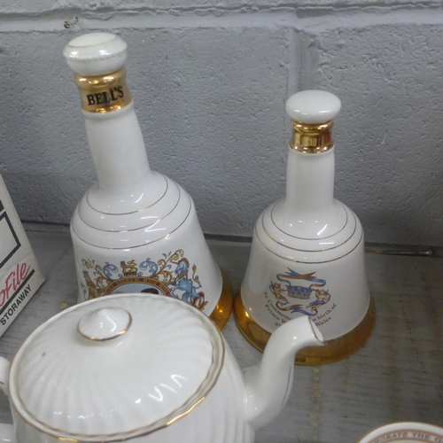 1093 - Two Bells Wade whisky decanters, 1982 and 1986 lacking contents, a Silver Jubilee 1977 teapot, an Ay... 