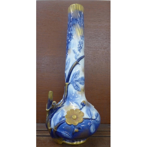 606 - A Burslem blue, white and gilt decorated bottle vase, 38cm