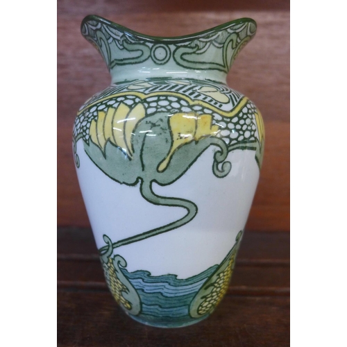 631 - A Doulton Burslem Art Nouveau Water Lilies vase, 14cm