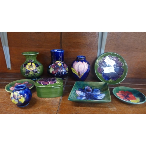 640 - A collection of Moorcroft, three small vases and a miniature vase, diamond shaped pin dish, three ci... 