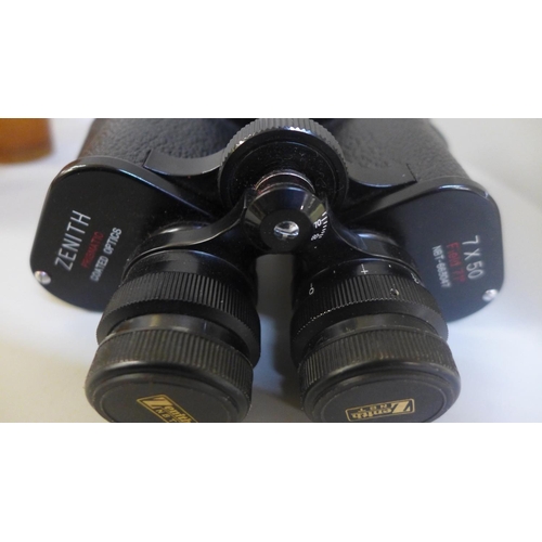 656 - A pair of Zenith binoculars and a graduated set of horn beakers in a leather case