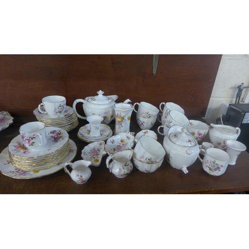 692 - A collection of Royal Crown Derby, Derby Posies china, nine cups and saucers, eight tea plates, six ... 