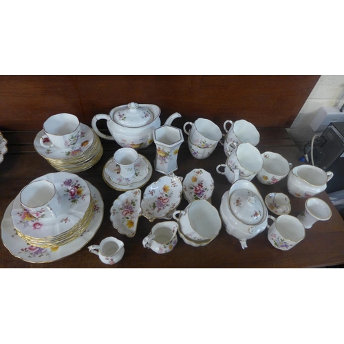 692 - A collection of Royal Crown Derby, Derby Posies china, nine cups and saucers, eight tea plates, six ... 