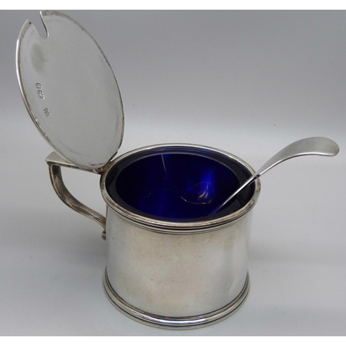 799 - A Victorian silver mustard pot with blue glass liner and matching spoon, mustard by Edward and John ... 