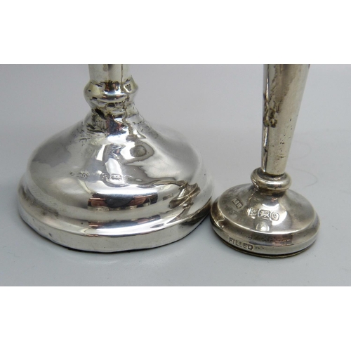 819 - Two silver vases, a pair of silver napkin rings and three other napkin rings