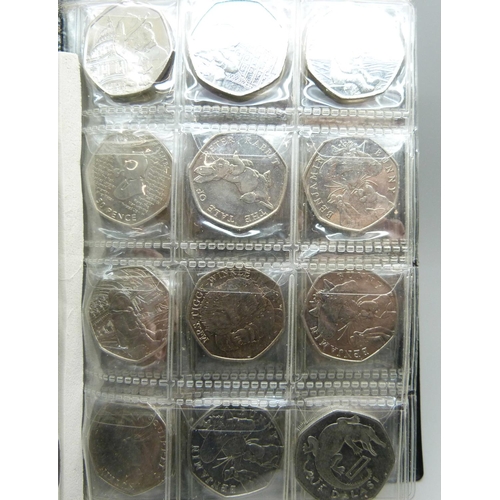 824 - A collection of commemorative 50p pieces and pound coins, including offside rule