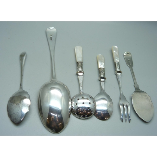 825 - A silver serving spoon, Sheffield 1906, 79g, and other servers