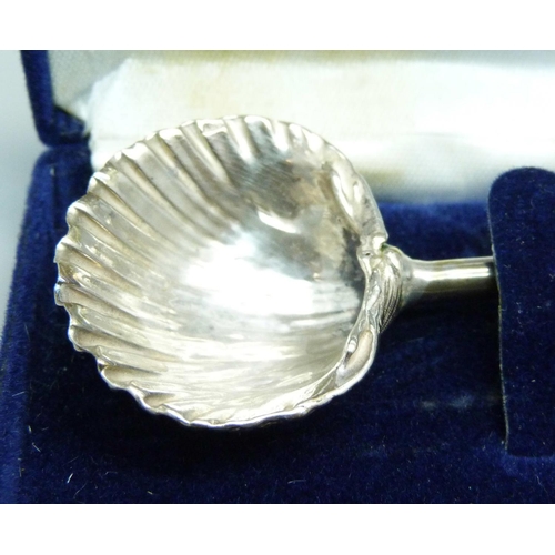 848 - A pair of silver sugar bows, silver spoon, silver base vase, silver ladle and a white metal model of... 