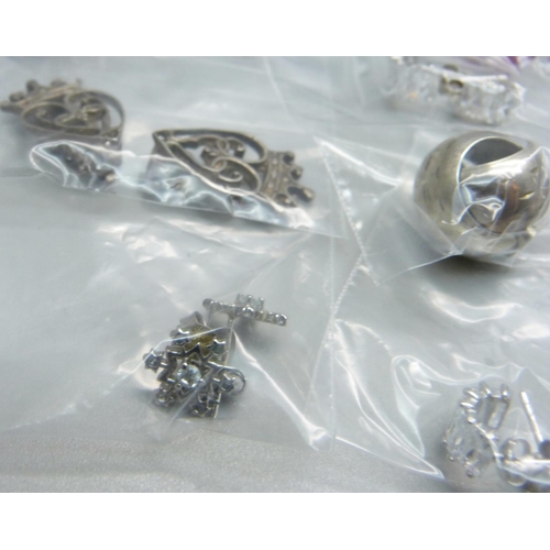 864 - Sixteen pairs of silver earrings