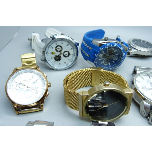 879 - A collection of fashion wristwatches