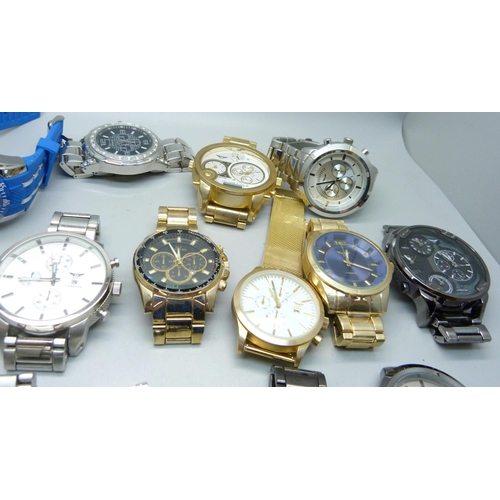 879 - A collection of fashion wristwatches