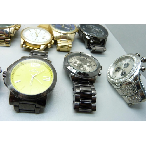 879 - A collection of fashion wristwatches