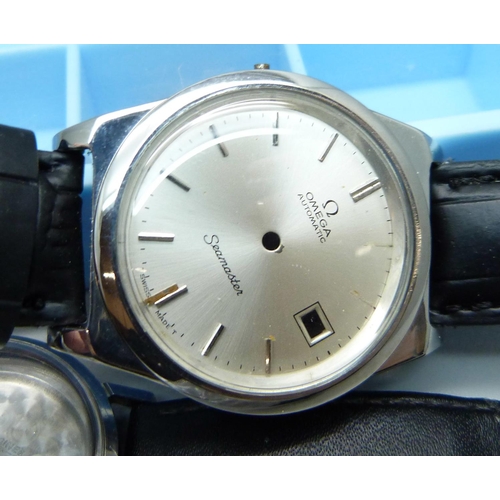 884 - Watch parts including Omega and two cases