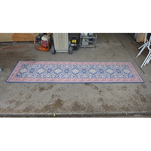 2432 - Handmade carpets blue patterned wool rug/runner approx 2.74 x 0.7mtr plus qty of vintage cutlery/fla... 