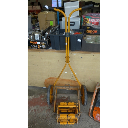 2454 - Isis scarifier with brusher and aerator accessories