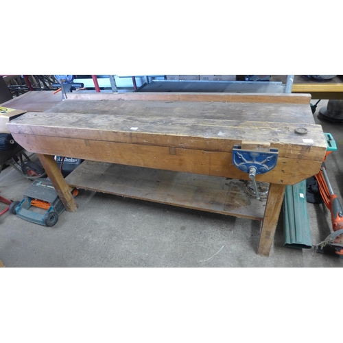 2464 - 7ft Work bench table with Record 57 vice attached