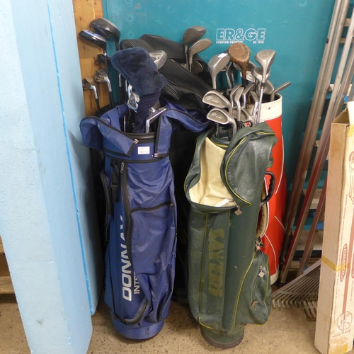 2482 - 5 golf bags with approx 50+ mixed golf clubs (Donnay, Enforcer, Bullet, Kings)