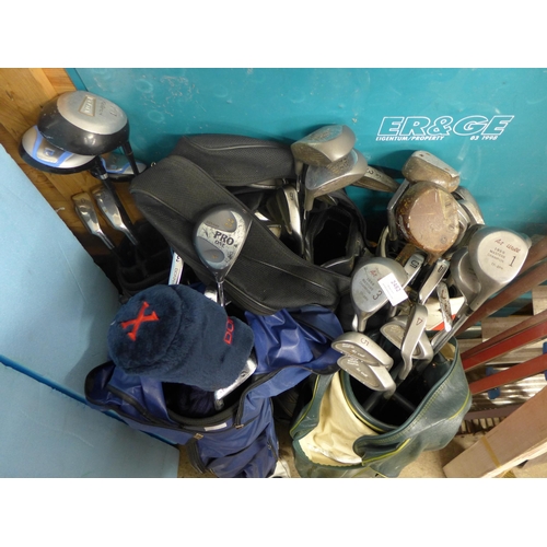 2482 - 5 golf bags with approx 50+ mixed golf clubs (Donnay, Enforcer, Bullet, Kings)