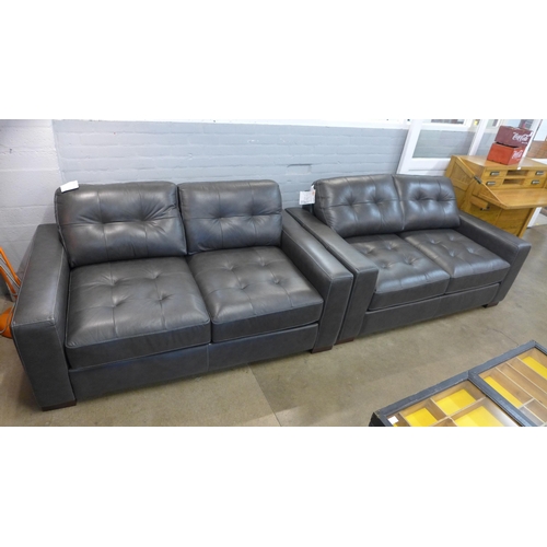 1320 - A pair of Montana slate leather pinched back 2 seater sofas