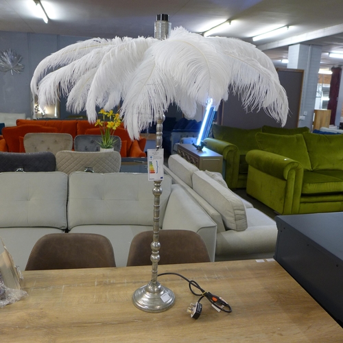 1338 - A white ostrich feather palm lamp