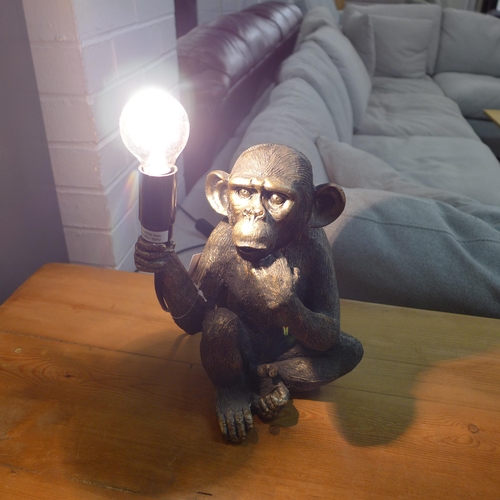 1393 - A monkey holding a bulb table lamp, H 23cms (3148821)   #