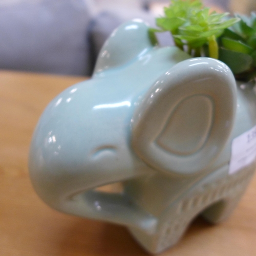 1396 - A faux succulent plant in a green ceramic elephant - H 17cms  (67689704 )