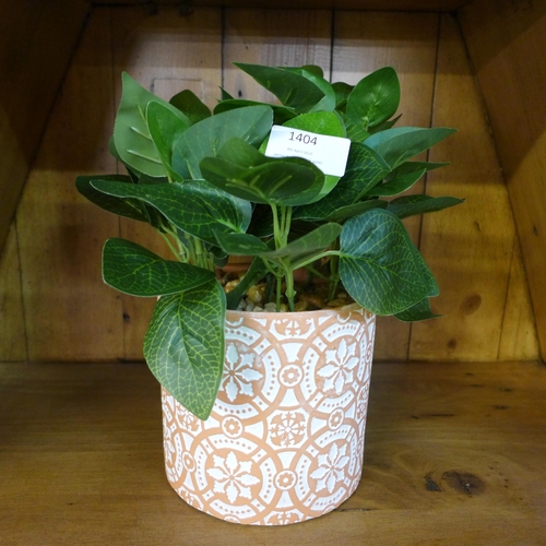 1404 - A faux green plant in a Moroccan tile pattern pot (63098104)