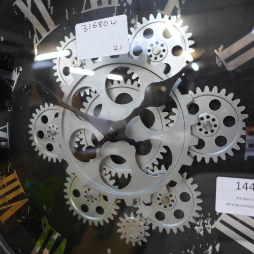 1446 - A moving gears wall clock