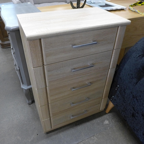 1472 - An oak effect five drawer narrow chest of drawers *This lot is subject to VAT