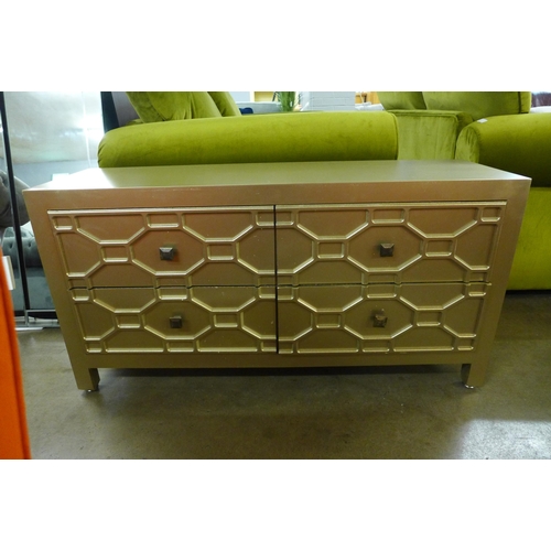 1371 - A gold four drawer low sideboard