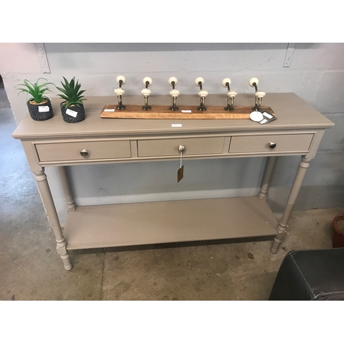 1330 - A grey three drawer console table