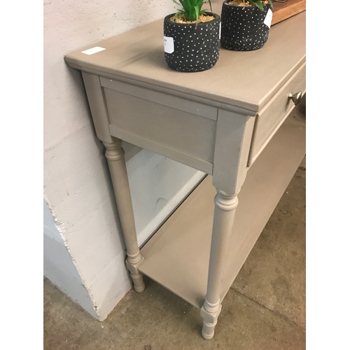 1330 - A grey three drawer console table