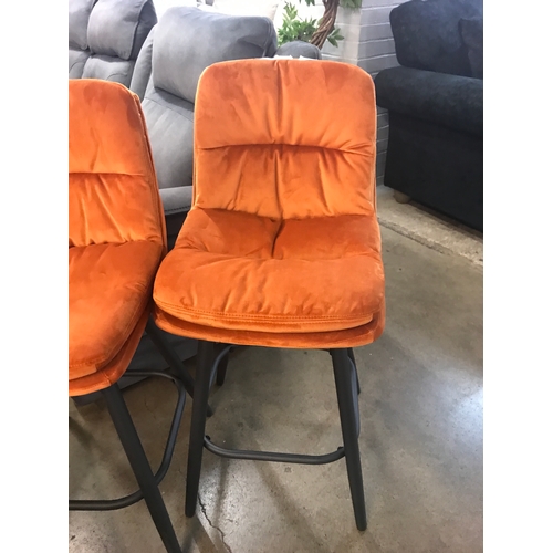 1332 - A pair of Enderson orange velvet bar stools