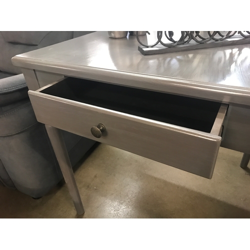 1335 - A small grey painted single drawer dining table