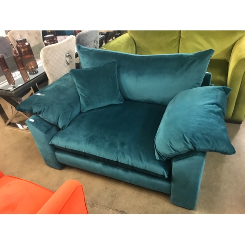 1339 - A teal velvet love seat