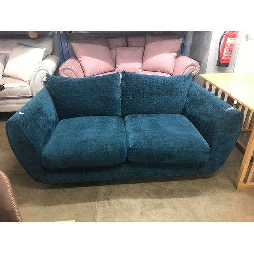 1353 - A deep blue textured velvet upholstered 2.5 seater sofa