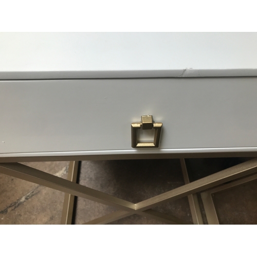 1383 - A pair of white bedside tables with gold legs