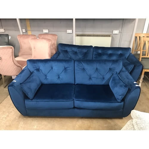 1403 - A pair blue velvet three seater sofas