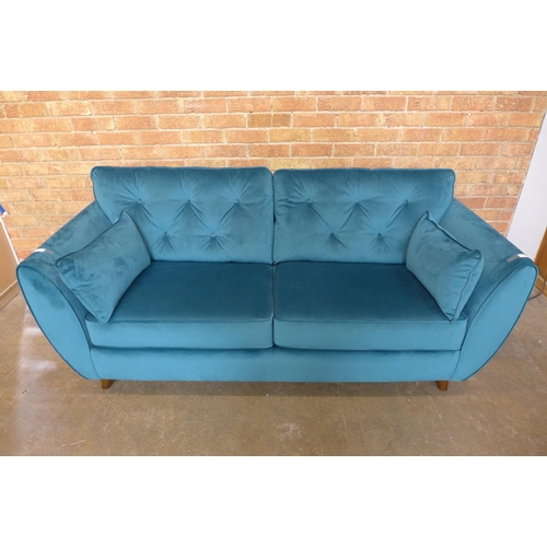 1411 - An Aquamarine velvet three seater sofa (W- 188cm D- 80cm H- 90cm)