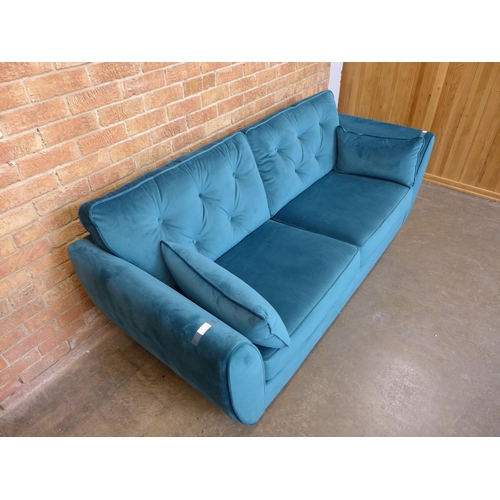 1411 - An Aquamarine velvet three seater sofa (W- 188cm D- 80cm H- 90cm)