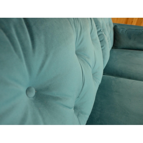 1411 - An Aquamarine velvet three seater sofa (W- 188cm D- 80cm H- 90cm)